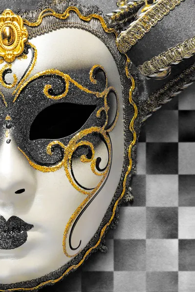 Mask with gold trim