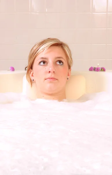 Young woman in bath-tub