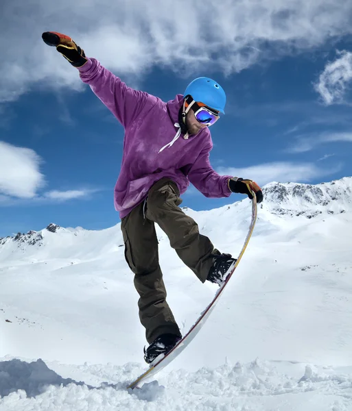 Snowboarder in mountains