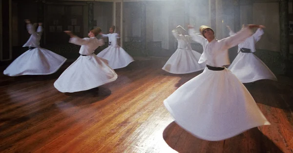 Whirling derwishes during traditional ceremony