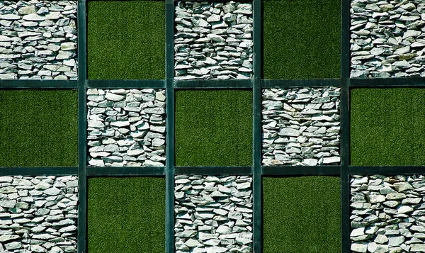Abstract of artificial grass with stone