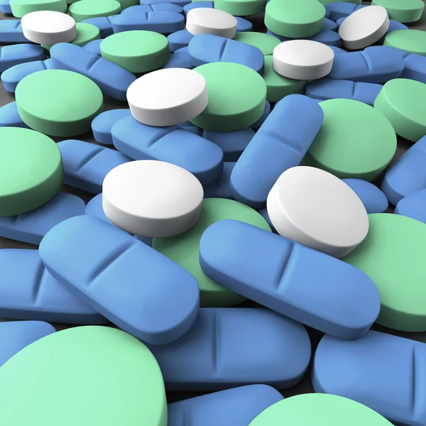 Medium shot of many green, blue and white tablets