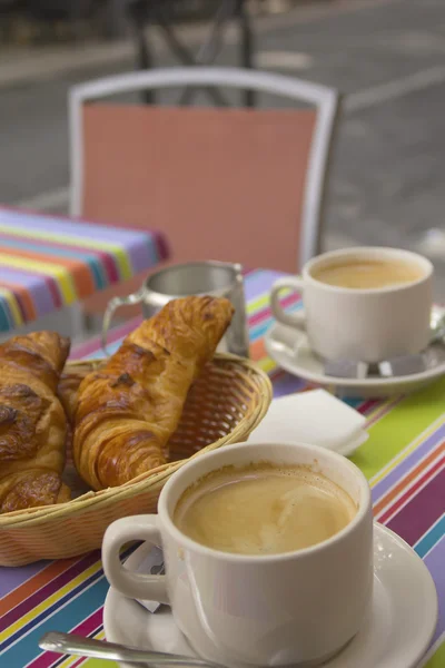 French breakfast with croissants, coffee and milk