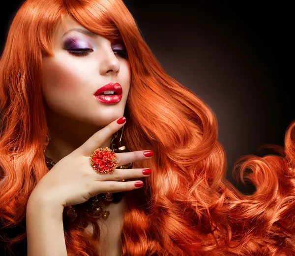 Wavy Red Hair. Fashion Girl Portrait