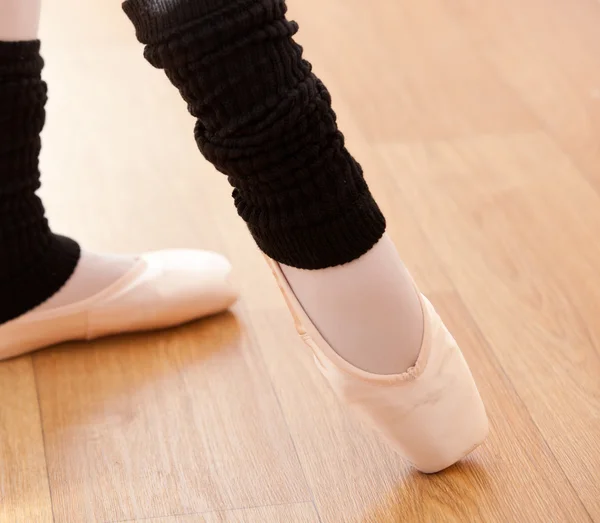 Close-up of the feet of a ballerina dancing