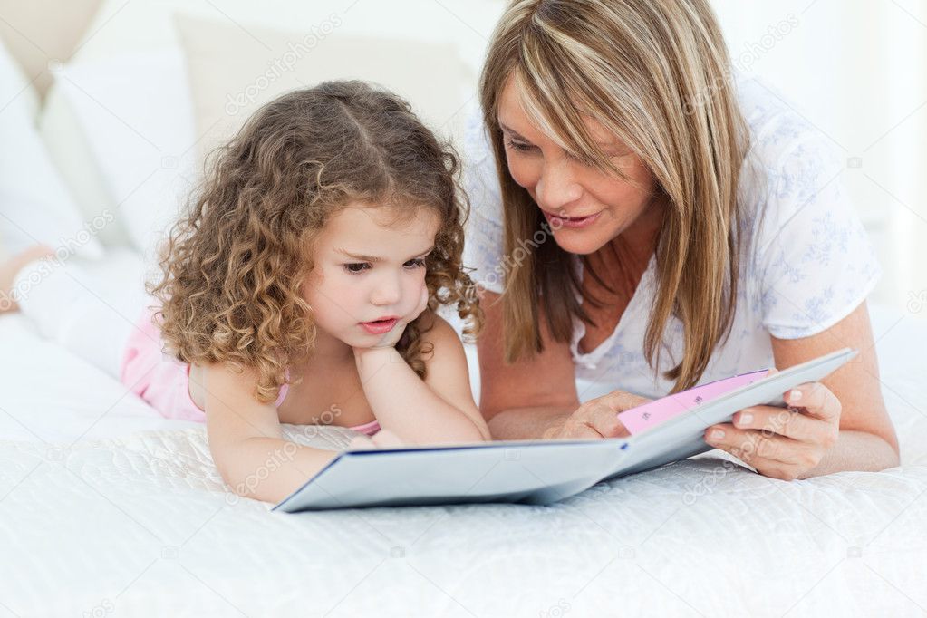 http://static9.depositphotos.com/1518767/1084/i/950/depositphotos_10843405-Young-girl-reading-a-book-with-her-grandmother.jpg