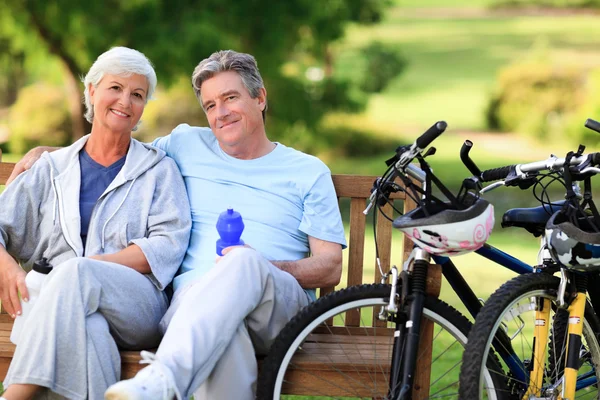 Elderly couple with their bikes