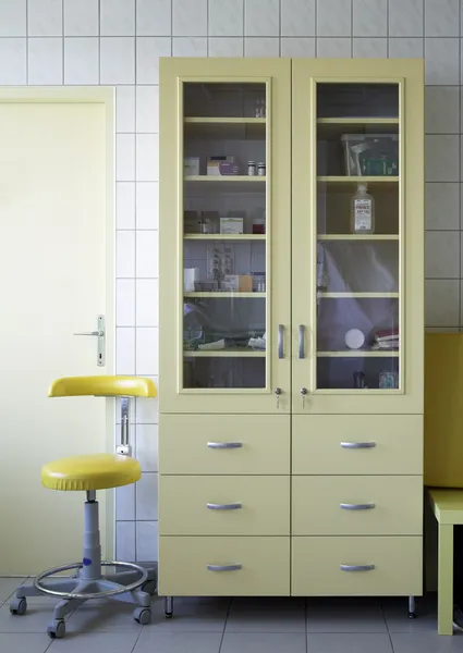 Cupboard and chair of a medical center