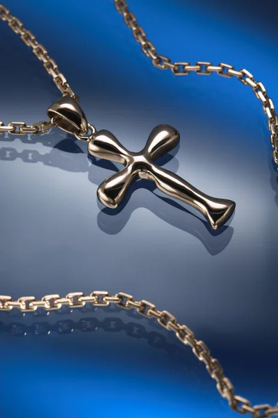 Golden cross and necklace jewelry