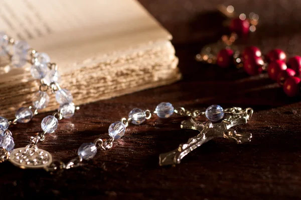 Silver Rosary with Old Book