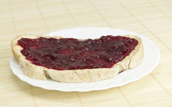 Slice of bread with jam.