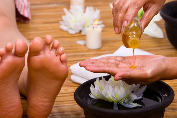 Pouring massage oil