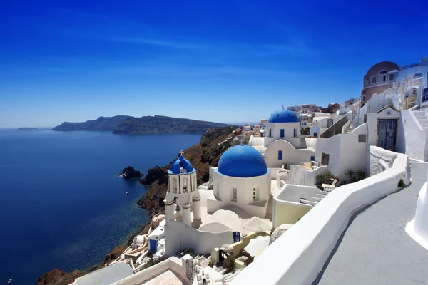 Santorini island with churches and sea view in Greece