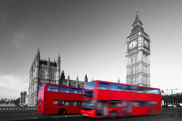 Big Ben with red double-decker in London, UK