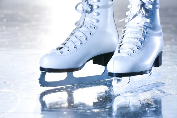 Dramatic landscape blue shot of ice skates