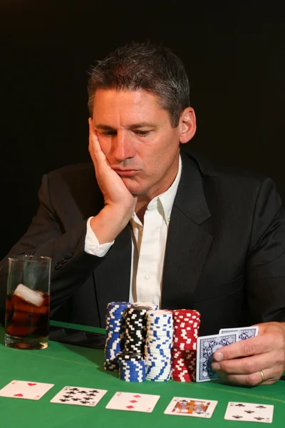 Poker player contemplating his next move