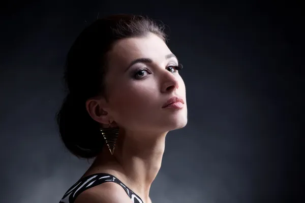 Portrait of luxury woman in exclusive jewelry