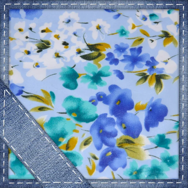 Jeans background with a flower print