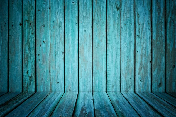 Dark room interior with blue painted wooden walls and floor — Stock Photo #11387797