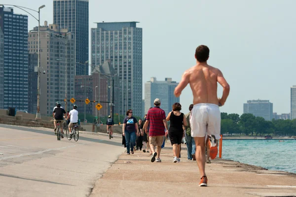 Being Active Along Lake Michigan Shoreline In Chicago