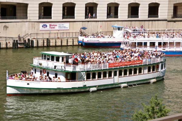 Sightseeing Boats Take Tourists Down Chicago River