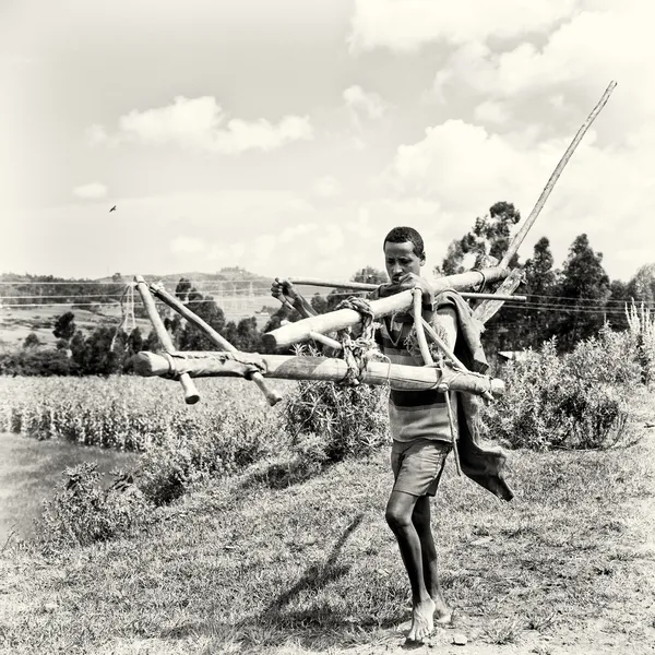 An Ethiopian man with the construction for the field