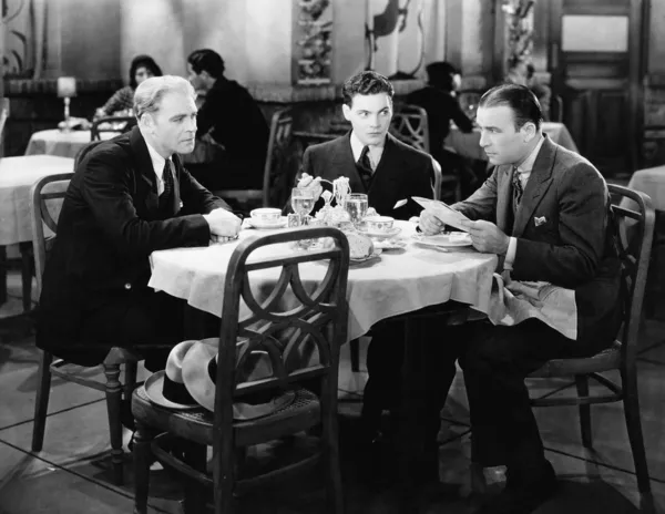 Businessmen meeting in restaurant