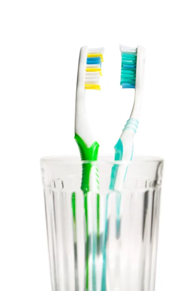 stock image Toothbrushes in transparent glass