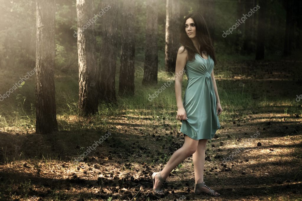 Woman tied to a tree Stock Image | iblalx03100002 | Fotosearch