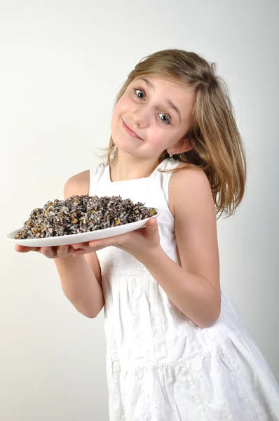 Young girl with traditional European Christmas food kutia — Stock Photo, Image