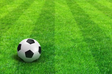 Green striped football field with soccer ball clipart