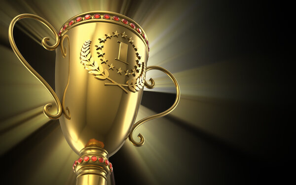 Golden glowing trophy cup on black background