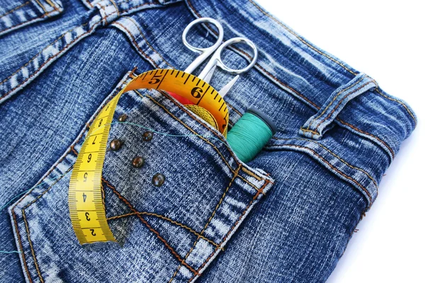Hulpmiddelen in jeans zak — Stockfoto