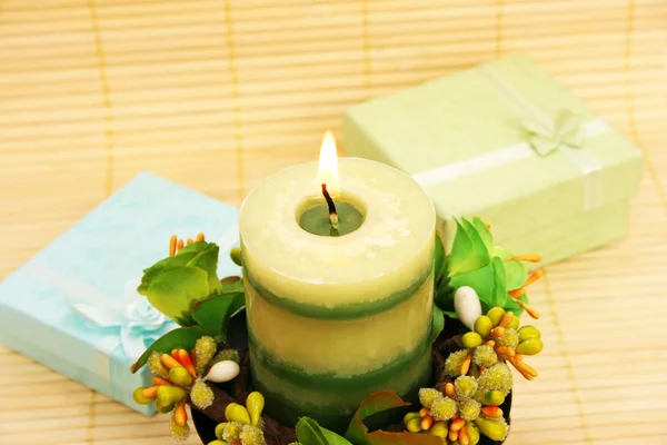 Candle and present boxes — Stock Photo, Image