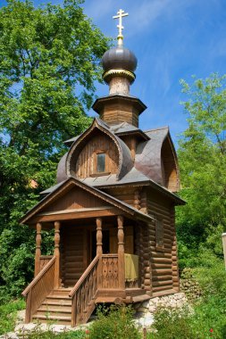 Orthodox wooden chapel near St. Sava's Spring clipart
