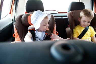 Children travelling in car clipart