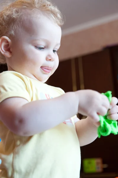 Little child modeling with clay — Stock Photo, Image