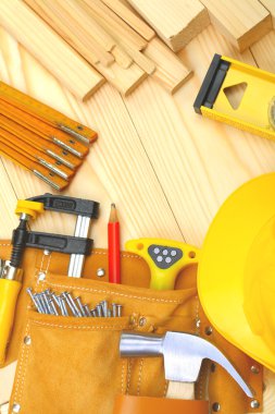 Set of construction tools on wooden boards clipart