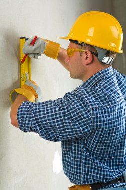 Worker does layout on concrette clipart