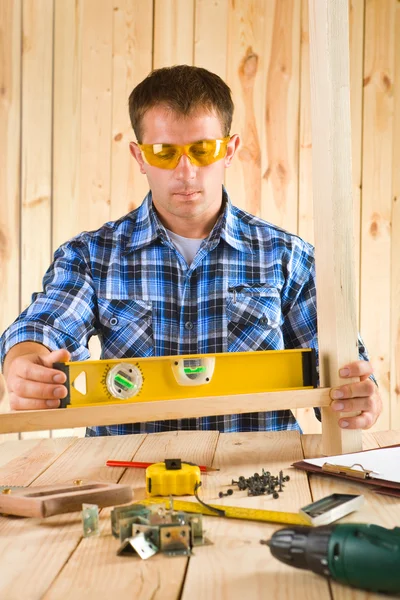 Men works with the level Stock Photo