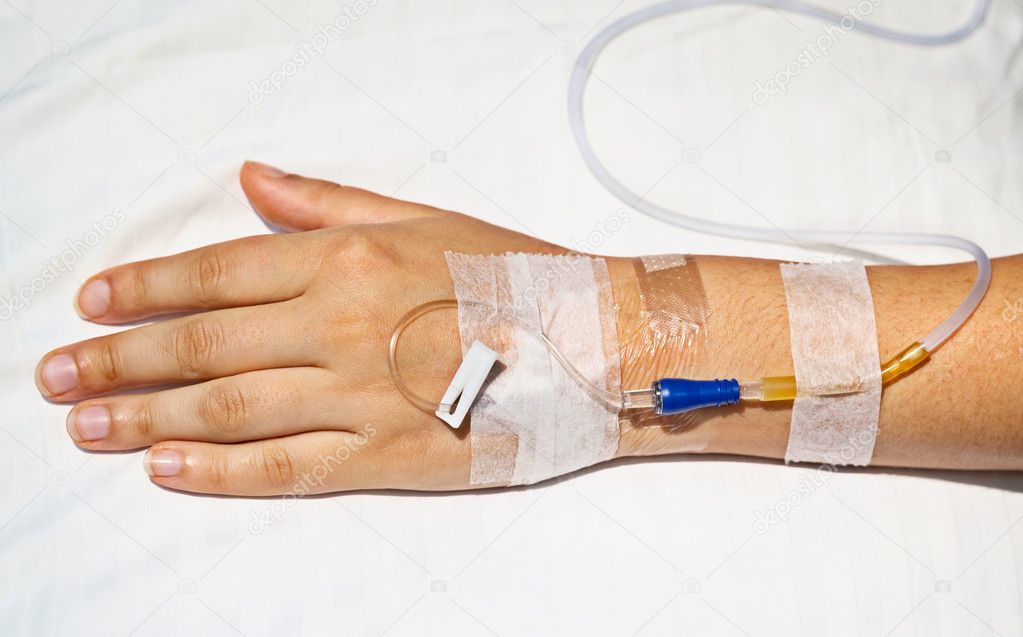 Medical intravenous cannula on hand — Stock Photo © pz.axe #11307592