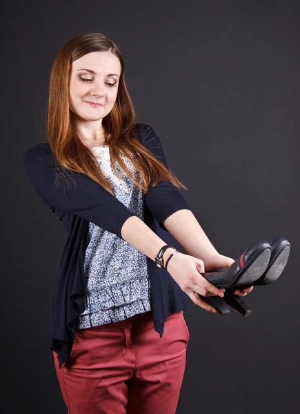 stock image Beautiful girl posing. black background.