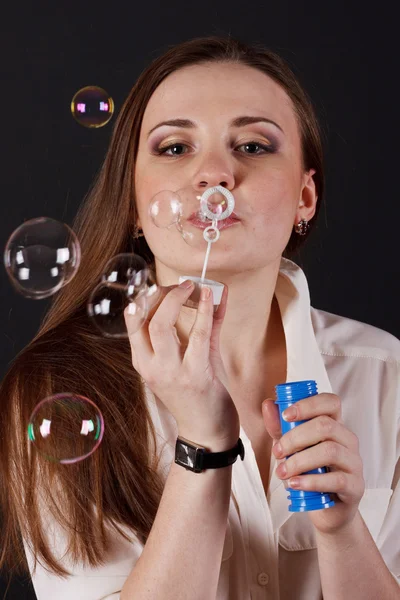 Girl blow bubbles — Stock Photo, Image