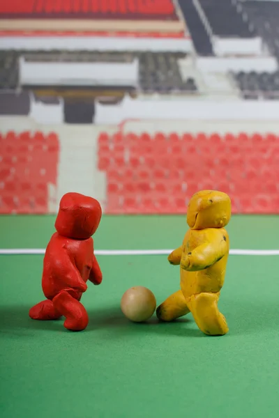 stock image Plasticine . Football scene.