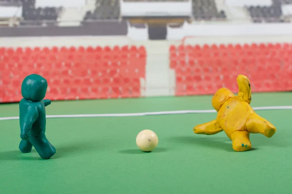 stock image Plasticine . Football scene.