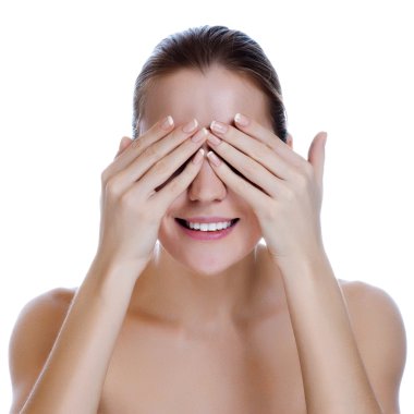 Laughing Woman Covering Her Eyes, close up of a womans laughing mouth and teeth with her hands covering her eyes. clipart