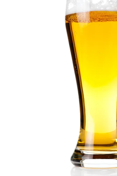 stock image Beer into glass isolated on white