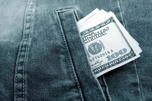 Доллары в кармане — стоковое фото