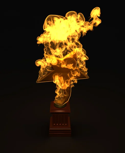 Prêmio estrela de ouro no fogo — Fotografia de Stock