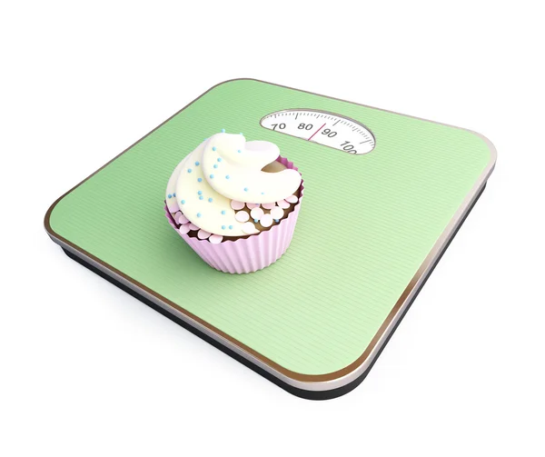 Bathroom scale with the cupcake — Stock Photo, Image